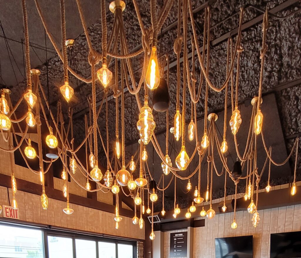 A beautiful design of yellow lights at a restaurant