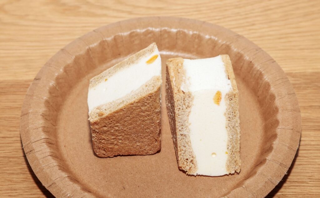 A picture of an orange creamsicle on a plate